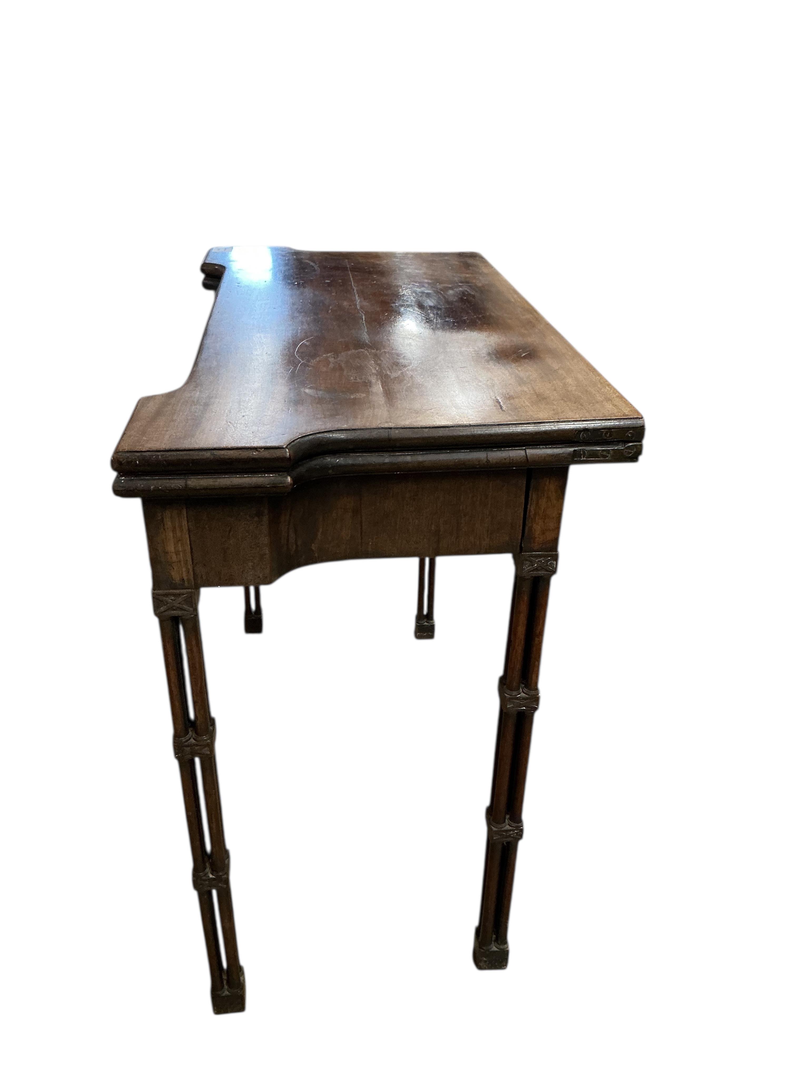 A George III Chippendale style mahogany folding card table on cluster column legs, width 90cm, depth 45cm, height 74cm